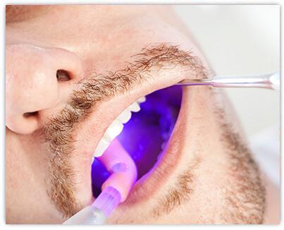 person undergoing an oral cancer screening
